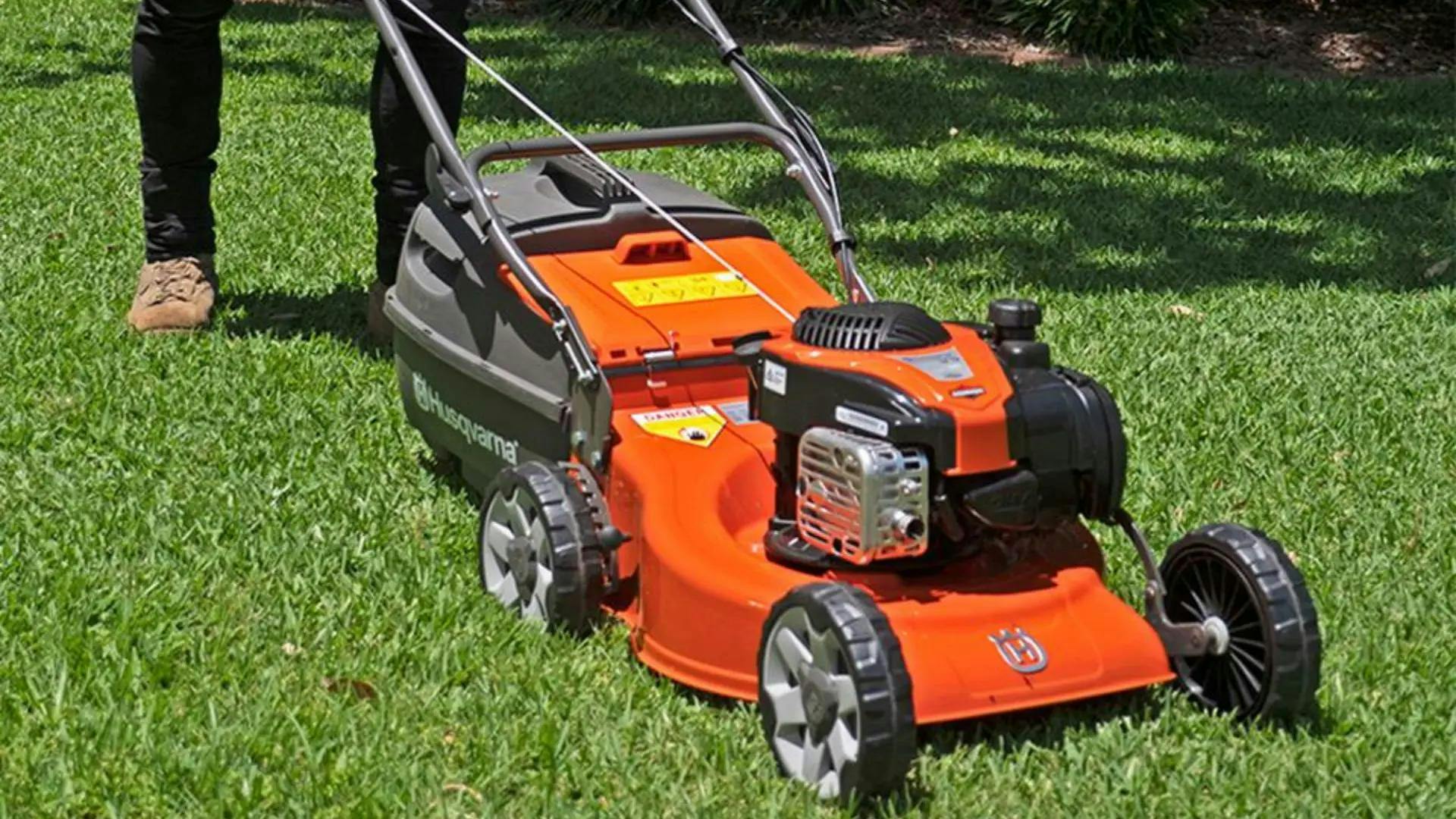 husqvarna lawnmowers on green grass